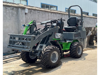 Încărcător frontal pe pneuri WCM