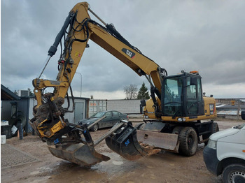Excavator pe roţi CATERPILLAR M313D