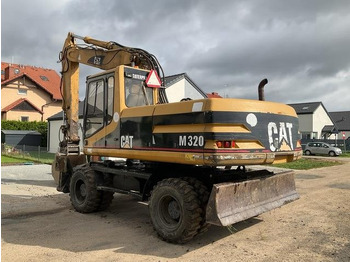 Excavator pe roţi CAT M320: Foto 3