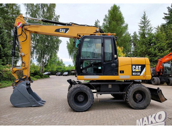Excavator pe roţi CATERPILLAR M313D