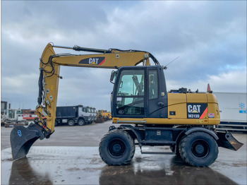 Excavator pe roţi CATERPILLAR M313D