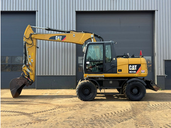 Excavator pe roţi CATERPILLAR M313D