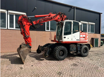 Excavator pe roţi ATLAS