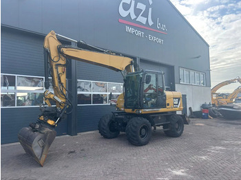 Excavator pe roţi CATERPILLAR M313D