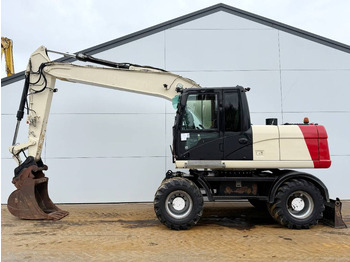 Excavator pe roţi CATERPILLAR M316D