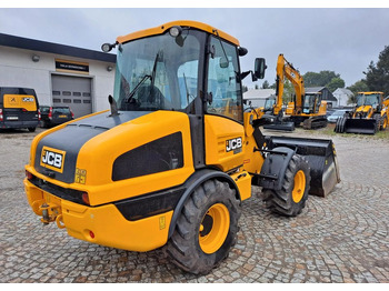 Încărcător frontal pe pneuri JCB 406: Foto 5