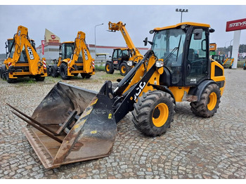 Încărcător frontal pe pneuri JCB 406: Foto 2