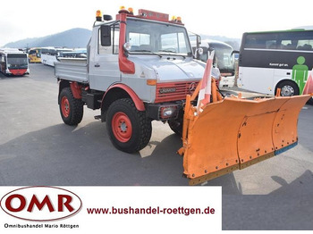 Camion basculantă UNIMOG