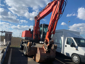 Excavator pe roţi O&K