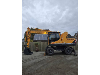 Excavator pe roţi HYUNDAI