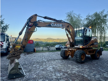 Excavator pe roţi CASE