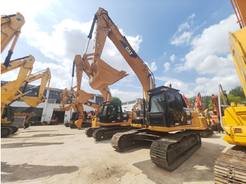 Excavator pe şenile CATERPILLAR 323D