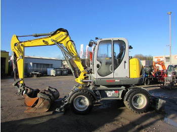 Excavator pe roţi WACKER