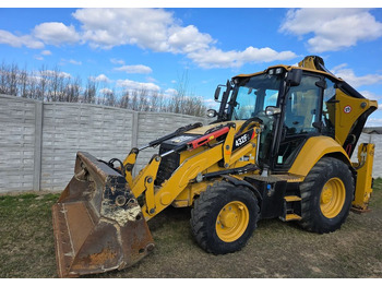 Buldoexcavator CATERPILLAR