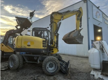 Excavator pe roţi WACKER