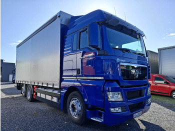 Camion cu prelată MAN TGX 26.440