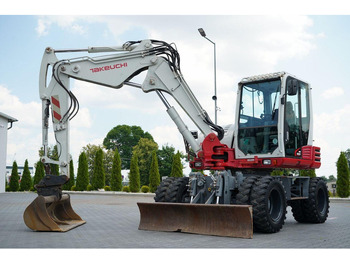 Excavator pe roţi TAKEUCHI