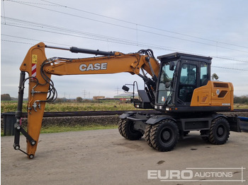 Excavator pe roţi CASE