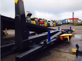 Sistem de agatare cu carlig/ Containere de gunoi