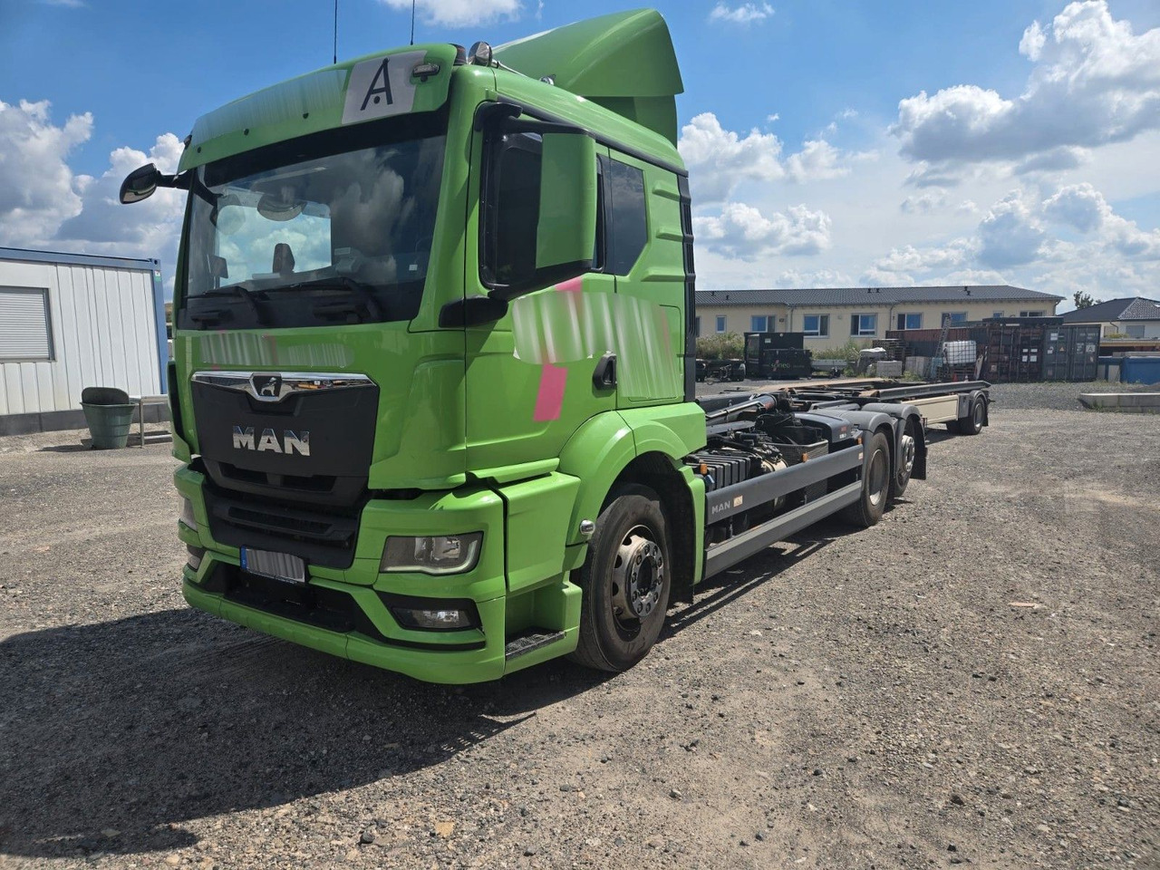 MAN TGS 26.510 Abrollkipper HIAB Lift -Lenkachse - Camion cu cârlig: Foto 1 MAN TGS 26.510 Abrollkipper HIAB Lift -Lenkachse - Camion cu cârlig: Foto 1
