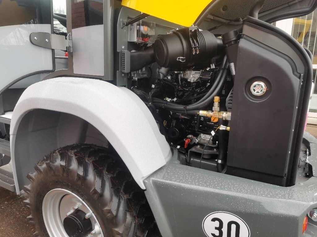 Încărcător frontal pe pneuri Kramer 5065: Foto 11