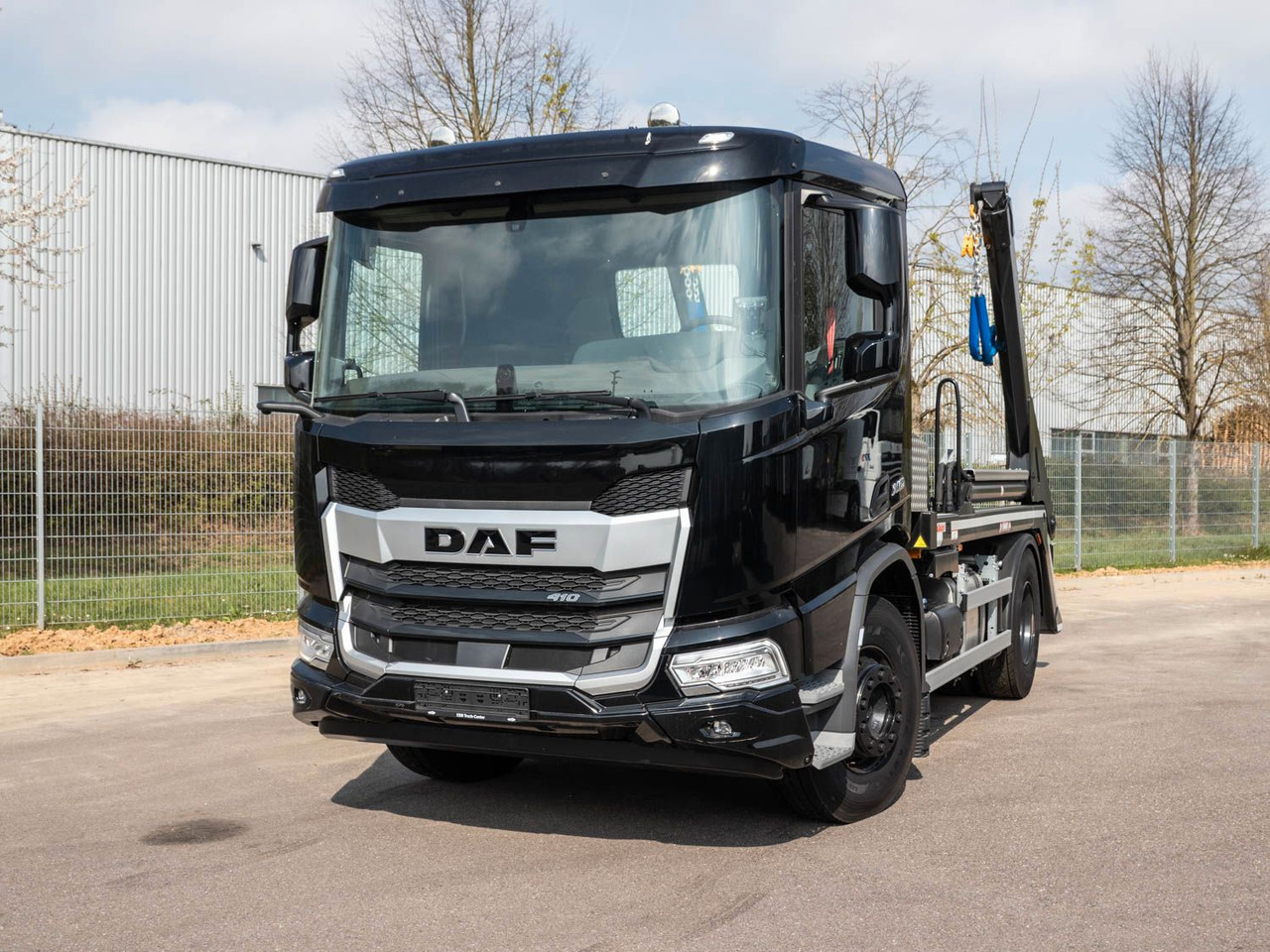 DAF FA XD 410 VDL Absetzkipper DAF FA XD 410 VDL Absetzkipper - Camion container de gunoi: Foto 1 DAF FA XD 410 VDL Absetzkipper DAF FA XD 410 VDL Absetzkipper - Camion container de gunoi: Foto 1