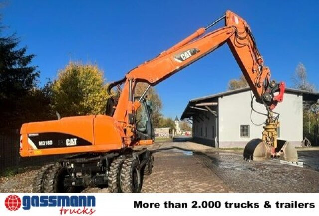 CAT M318D Mobilbagger - Excavator pe roţi: Foto 4 CAT M318D Mobilbagger - Excavator pe roţi: Foto 4