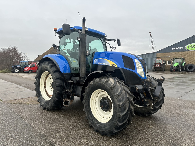New Holland T6080 - Tractor agricol: Foto 4 New Holland T6080 - Tractor agricol: Foto 4