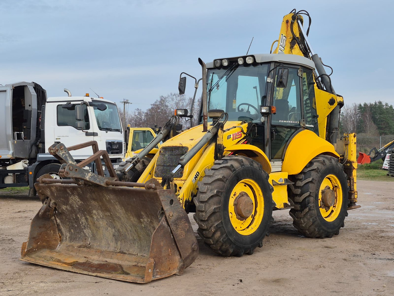 NEW HOLLAND B115 4PS - Buldoexcavator: Foto 1 NEW HOLLAND B115 4PS - Buldoexcavator: Foto 1