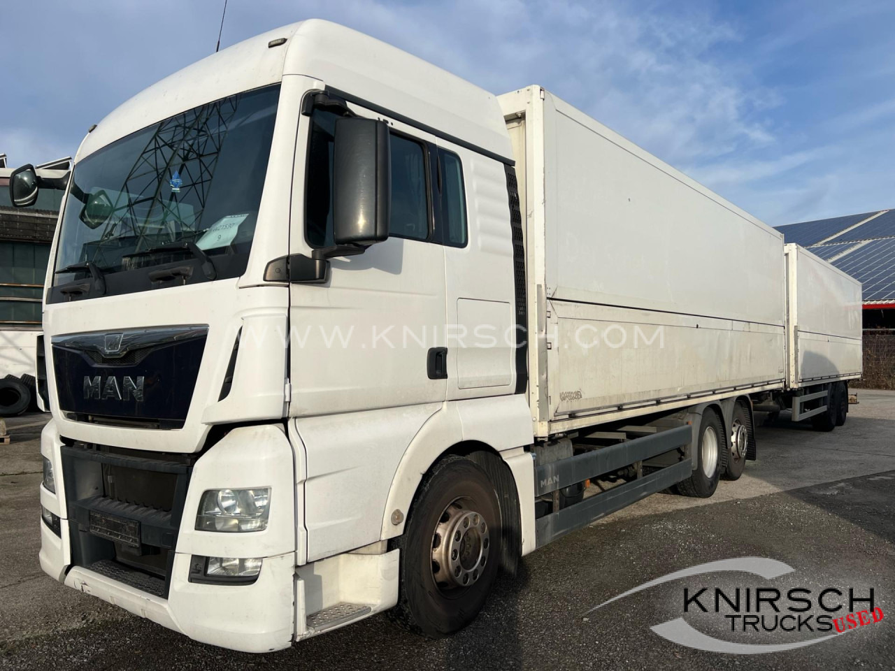 MAN TGA 26.480 Schwenkwandaufbau mit Böhm - Camion pentru transportul băuturilor: Foto 1 MAN TGA 26.480 Schwenkwandaufbau mit Böhm - Camion pentru transportul băuturilor: Foto 1