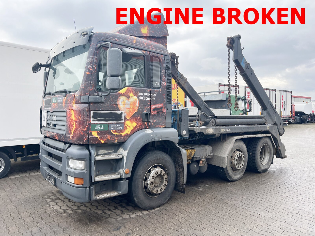 MAN TGA 26.410 6X2/4 BL Motorschaden! TGA 26.410 6X2/4 BL, Vorlauf Lenk-Liftachse, Meiller Tele. - Camion container de gunoi: Foto 1 MAN TGA 26.410 6X2/4 BL Motorschaden! TGA 26.410 6X2/4 BL, Vorlauf Lenk-Liftachse, Meiller Tele. - Camion container de gunoi: Foto 1