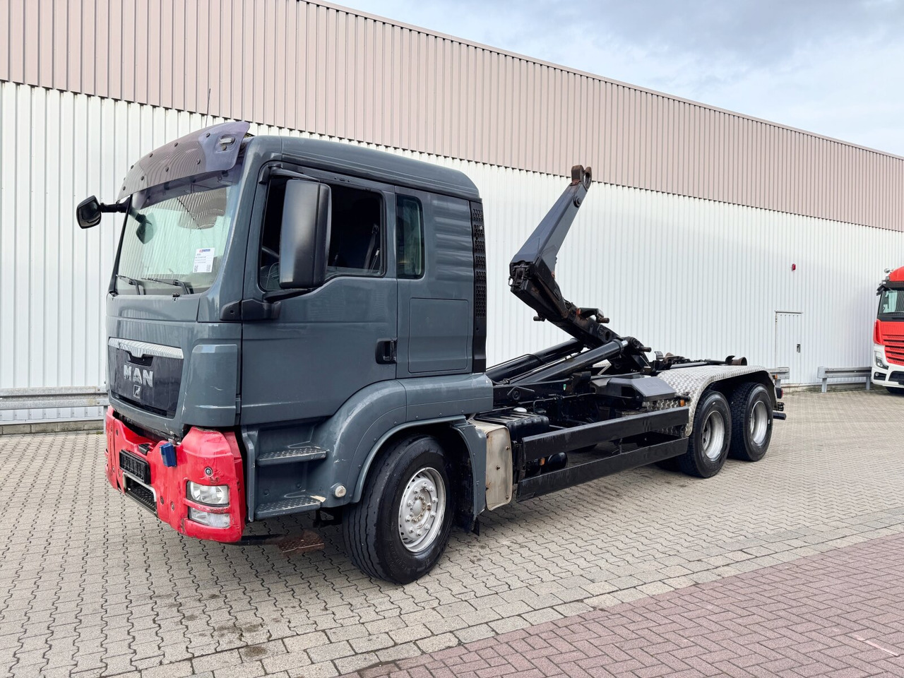 MAN TGS 26.440 6x4 BB TGS 26.440 6x4 BB, Meiller Schub-Knick - Camion cu cârlig: Foto 1 MAN TGS 26.440 6x4 BB TGS 26.440 6x4 BB, Meiller Schub-Knick - Camion cu cârlig: Foto 1