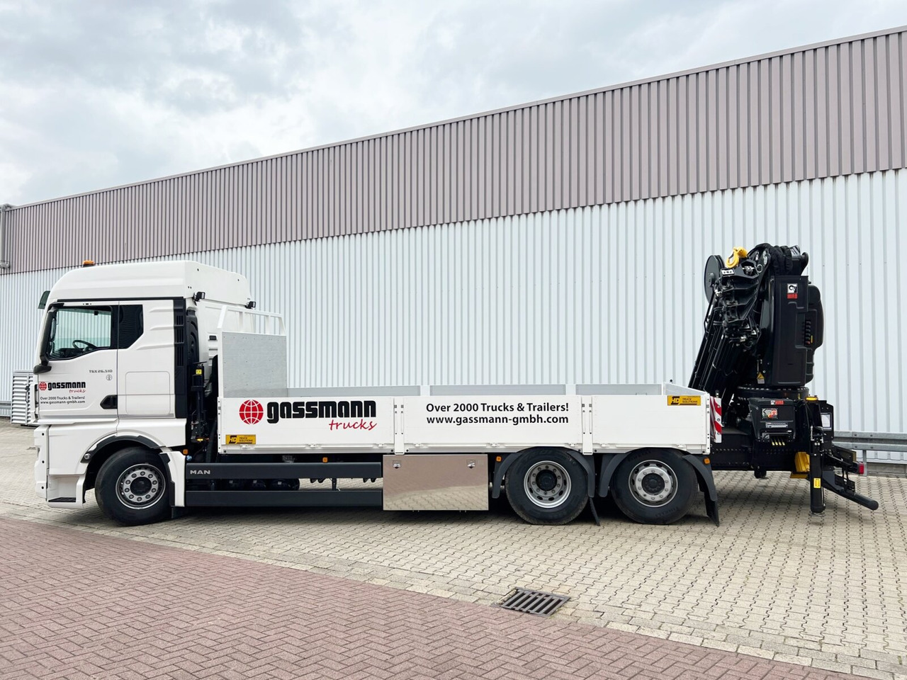 MAN TGX 26.510 6x2-4 LL CH TGX 26.510 6x2-4 LL, Kran Hiab X-HiPro 548 E-8, Lenk-/Liftachse, TwistLock 20Fuß, Funk, Retarder - Camion cu macara, Camion platformă: Foto 2 MAN TGX 26.510 6x2-4 LL CH TGX 26.510 6x2-4 LL, Kran Hiab X-HiPro 548 E-8, Lenk-/Liftachse, TwistLock 20Fuß, Funk, Retarder - Camion cu macara, Camion platformă: Foto 2