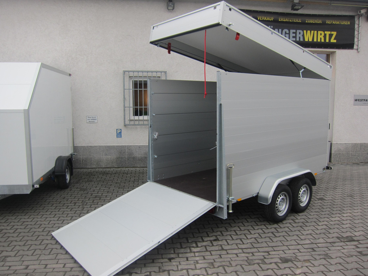 ALUBOXX Deckelanhänger GTT 2500 VT4 301x151x188cm Heckrampe (M) 2500kg order online Aktion - Remorcă furgon: Foto 1 ALUBOXX Deckelanhänger GTT 2500 VT4 301x151x188cm Heckrampe (M) 2500kg order online Aktion - Remorcă furgon: Foto 1
