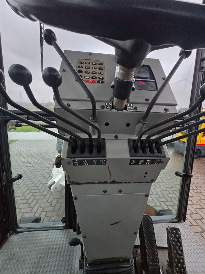 Autogreder New Holland F106.6: Foto 15