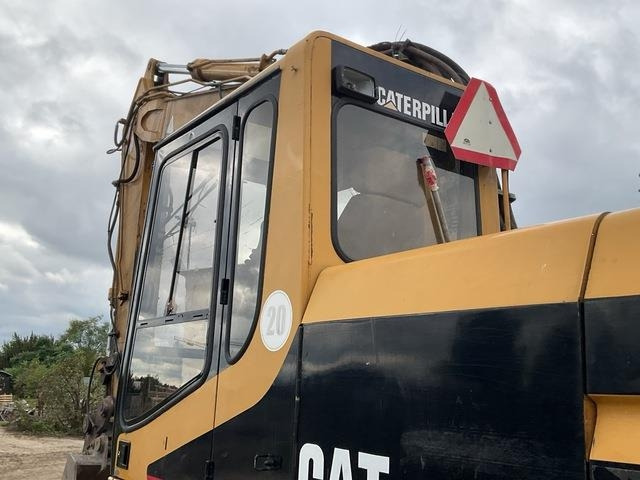 Excavator pe roţi CAT M320: Foto 20