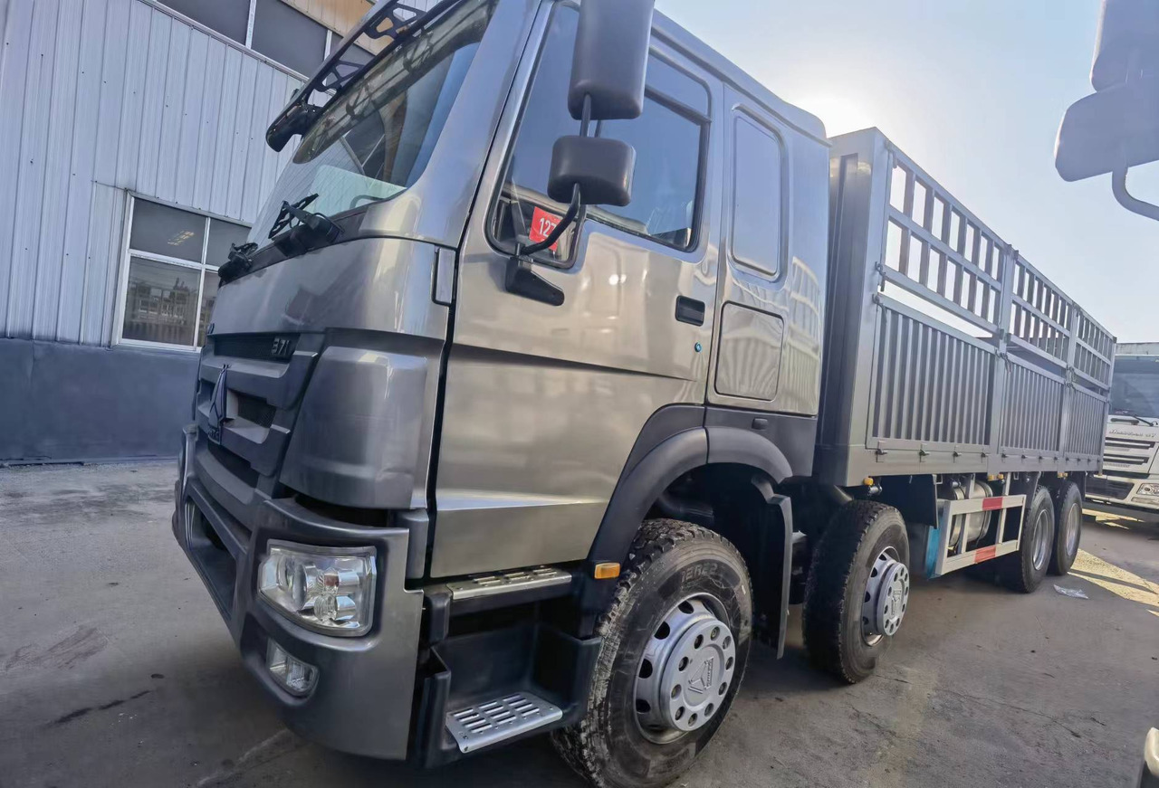 Camion platformă Sinotruk HOWO 371 8*4 Fence truck: Foto 7 Camion platformă Sinotruk HOWO 371 8*4 Fence truck: Foto 7