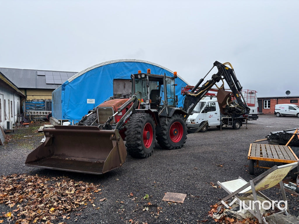 Grävlastare - Huddig, 860 - Buldoexcavator: Foto 1 Grävlastare - Huddig, 860 - Buldoexcavator: Foto 1