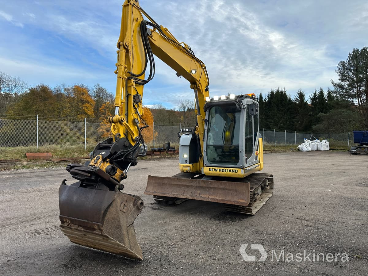 Grävmaskin New Holland Kobelco E70BSR-2 - Excavator pe şenile: Foto 3 Grävmaskin New Holland Kobelco E70BSR-2 - Excavator pe şenile: Foto 3