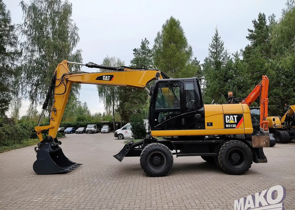 Caterpillar M313D - Excavator pe roţi: Foto 1 Caterpillar M313D - Excavator pe roţi: Foto 1