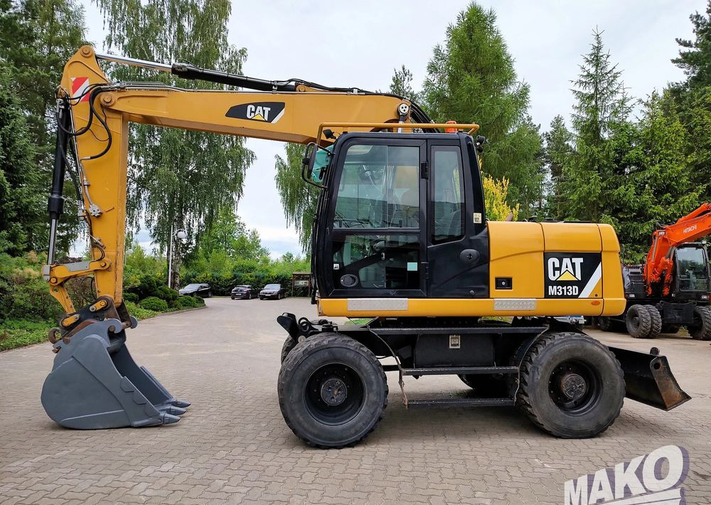 Caterpillar M313D - Excavator pe roţi: Foto 1 Caterpillar M313D - Excavator pe roţi: Foto 1
