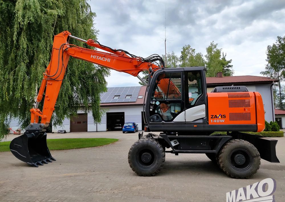 Hitachi ZX 140 - Excavator pe roţi: Foto 1 Hitachi ZX 140 - Excavator pe roţi: Foto 1