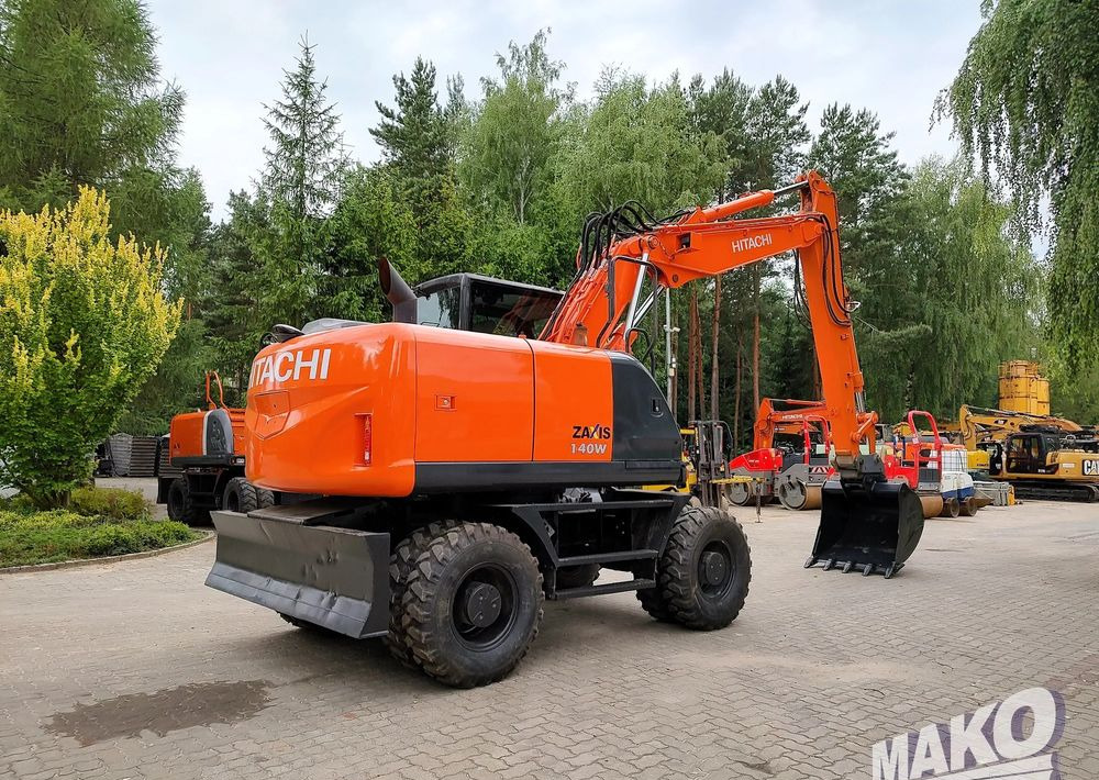 Hitachi ZX 140 - Excavator pe roţi: Foto 4 Hitachi ZX 140 - Excavator pe roţi: Foto 4