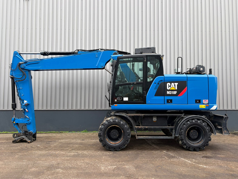 Caterpillar M318F - Excavator pe roţi: Foto 1 Caterpillar M318F - Excavator pe roţi: Foto 1