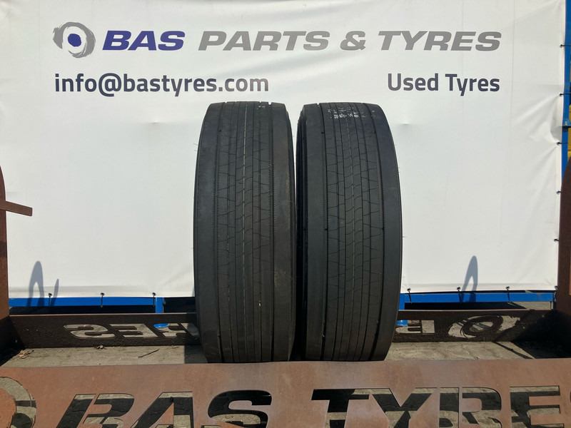 Bridgestone Bridgestone 315/70R22.5 Enliten Steer 154/150 M+S 3PMSF gebruikte set - Anvelopă pentru Camion: Foto 1 Bridgestone Bridgestone 315/70R22.5 Enliten Steer 154/150 M+S 3PMSF gebruikte set - Anvelopă pentru Camion: Foto 1