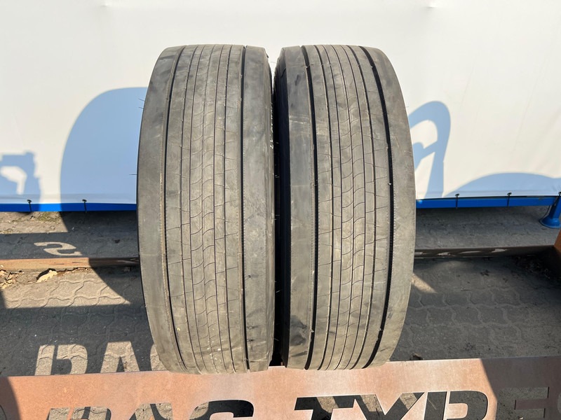 Bridgestone Bridgestone 315/70R22.5 Enliten Steer 154/150 M+S 3PMSF gebruikte set - Anvelopă pentru Camion: Foto 1 Bridgestone Bridgestone 315/70R22.5 Enliten Steer 154/150 M+S 3PMSF gebruikte set - Anvelopă pentru Camion: Foto 1