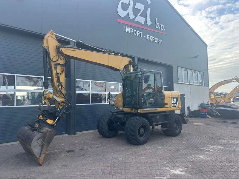 Caterpillar M313D - Excavator pe roţi: Foto 1 Caterpillar M313D - Excavator pe roţi: Foto 1