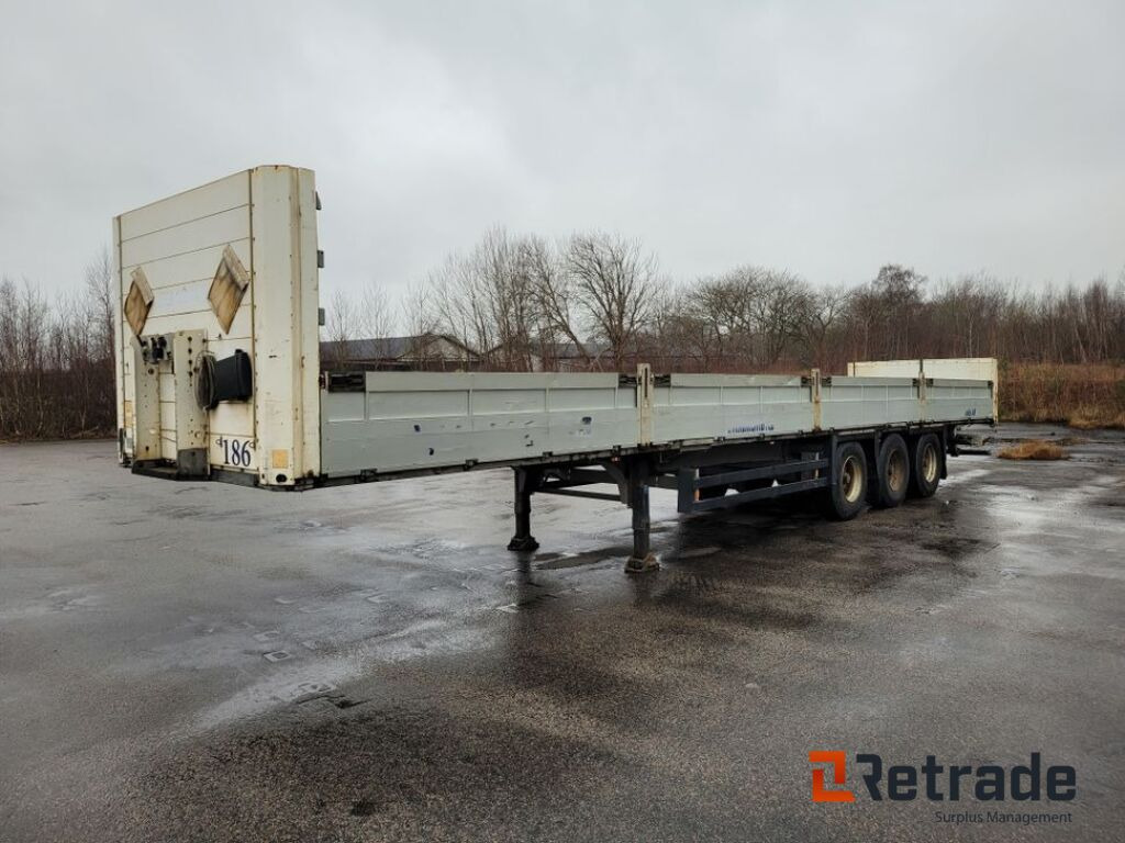 3-axlig trailer med lämmar SCHMITS, S01 Flaktrailer - Semiremorcă platformă: Foto 1 3-axlig trailer med lämmar SCHMITS, S01 Flaktrailer - Semiremorcă platformă: Foto 1