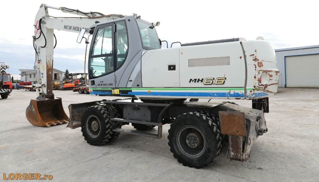 New Holland MH 6.6 + Sandvic Hammer - Excavator pe roţi: Foto 3 New Holland MH 6.6 + Sandvic Hammer - Excavator pe roţi: Foto 3