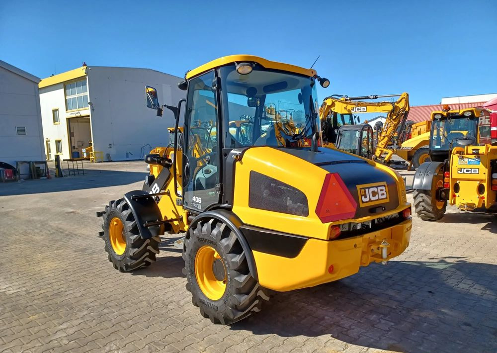 JCB 406 - Încărcător frontal pe pneuri: Foto 4 JCB 406 - Încărcător frontal pe pneuri: Foto 4